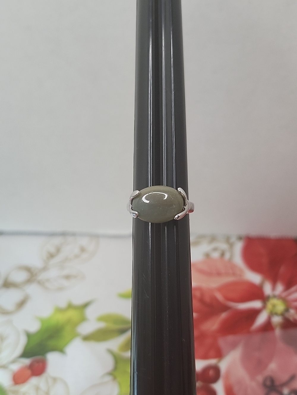 Elegant Silver Ring with Oval Green Stone